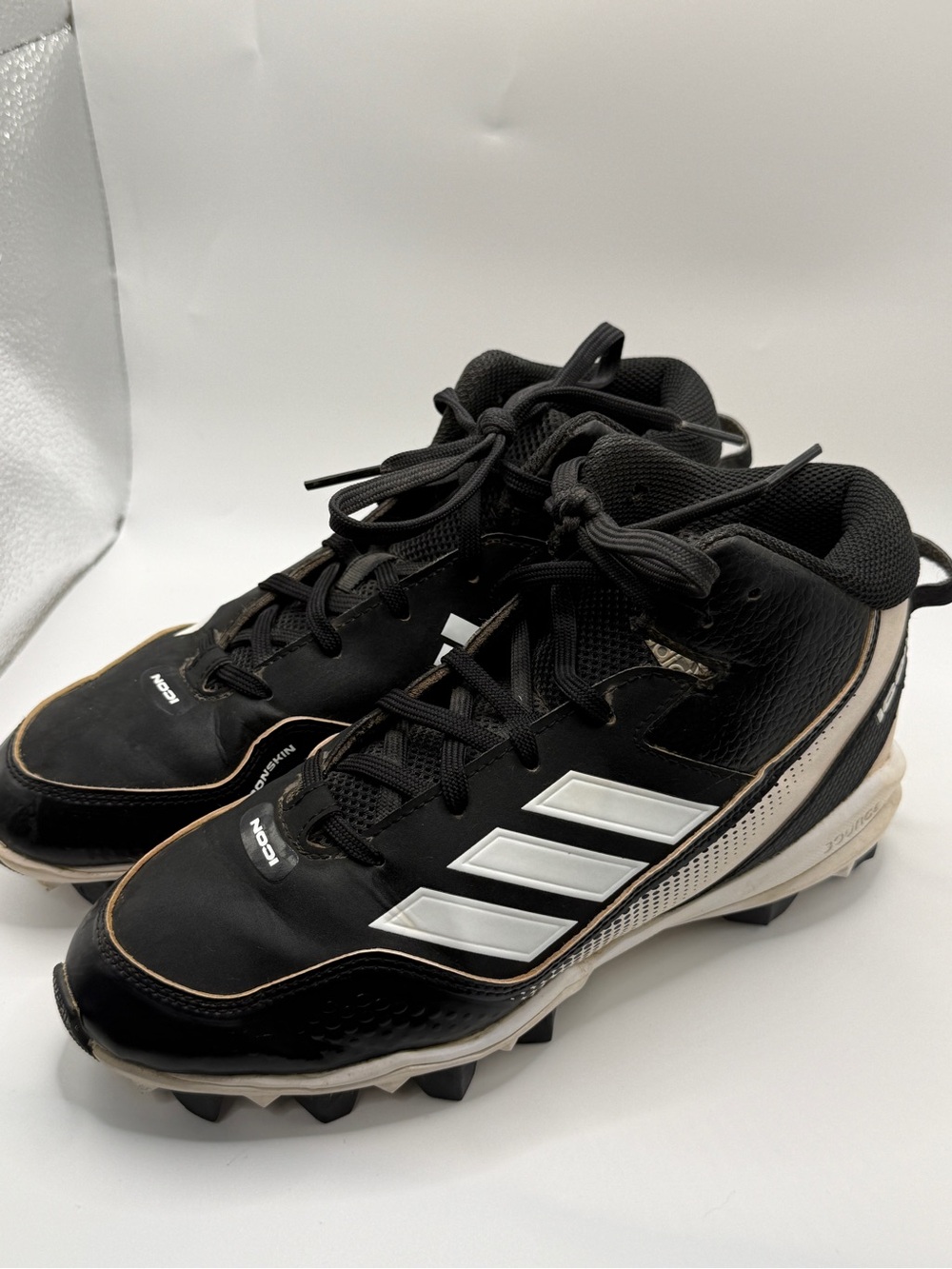 adidas Kids Black and White High-Top baseball cleats